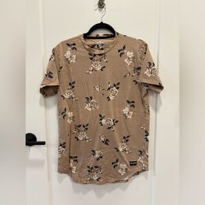 Tan and black floral print T-shirt with long curved hem